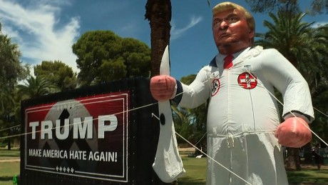 Inflatable of Donald Trump in KKK robe pops up at rally - CNN Video