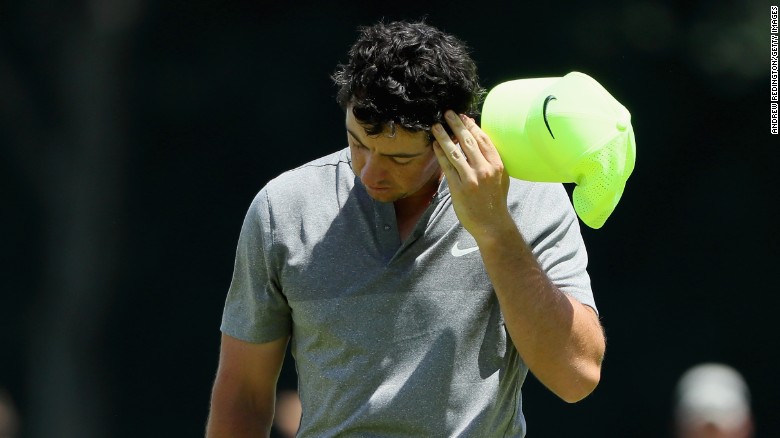 A deflated Rory McIlroy walks off his final hole of the second round at the U.S. Open having missed the cut. 