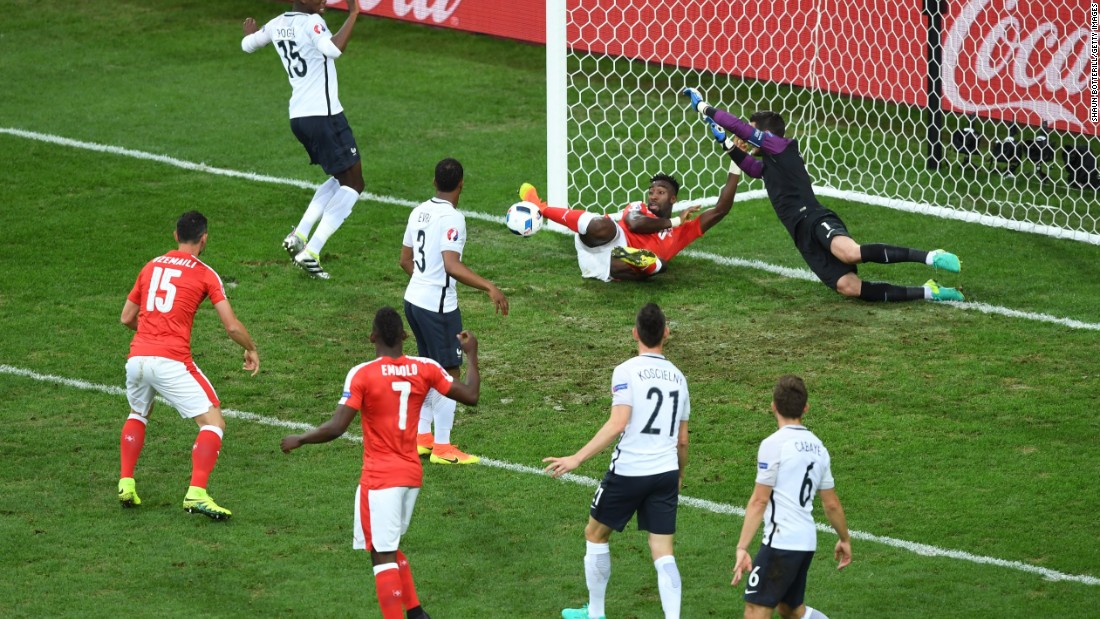 Johan Djourou of Switzerland clears the ball off the goal line.