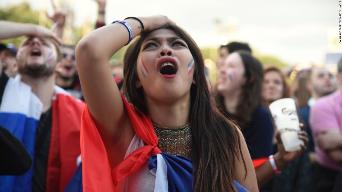 A French fan reacts during the game. 