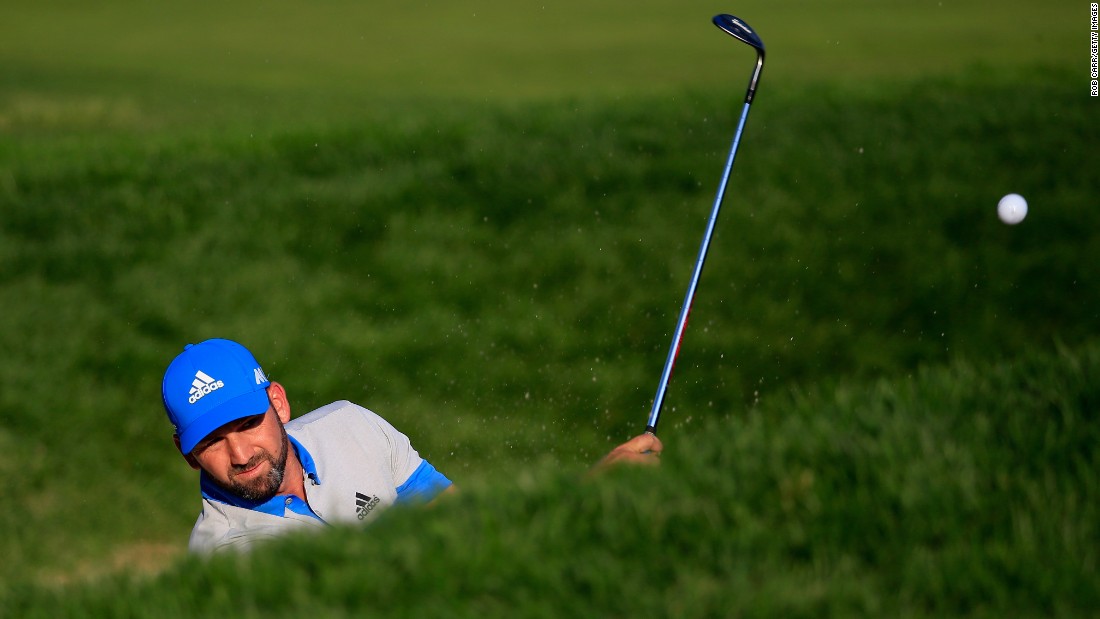 Sergio Garcia of Spain plays out of the bunker on the 16th hole on June 19. 