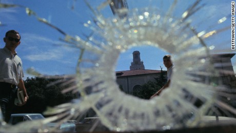 A view of the tower where Charles Whitman carried out his sniper spree through a bullet hole in glass, August 1, 1966.