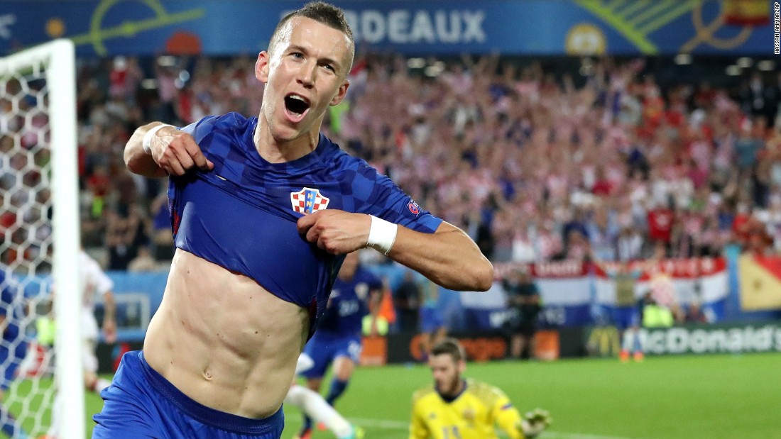 Croatia&#39;s Ivan Perisic takes off his shirt to celebrate his match-winning goal against Spain on Tuesday, June 21. He also assisted a goal in Croatia&#39;s 2-1 comeback victory. Croatia topped Group D and awaits its next opponent in the round of 16. Spain finished second in the group and has a date set with Italy.