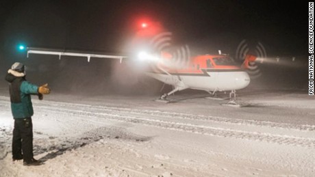 A Twin Otter aircraft taxis at the Amundsen-Scott South Pole Station.