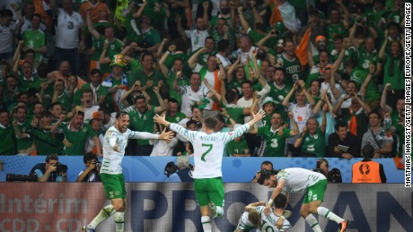 Ireland&#39;s players celebrate with supporters after Robbie Brady&#39;s late strike.