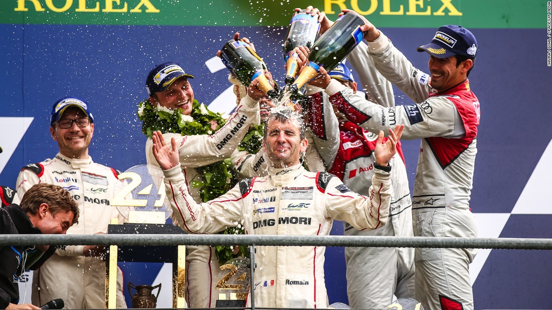 The Porsche team, which included Lucas di Grassi (far right), were gifted the win this year after the Toyota team broke down on the last lap.  