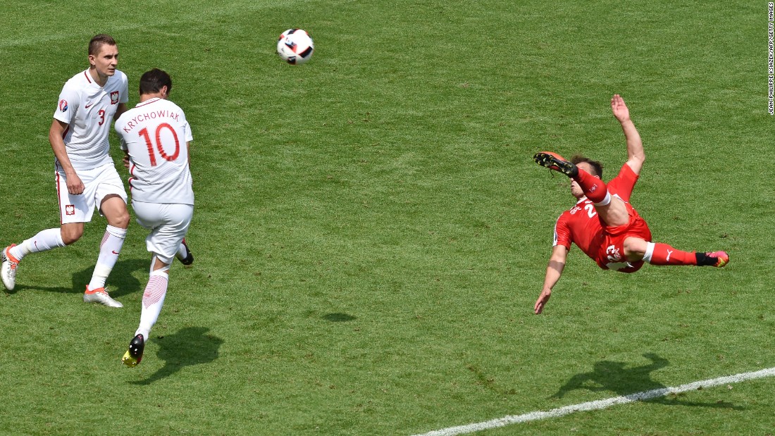 Shaqiri shoots to score on the volley in the 82nd minute.