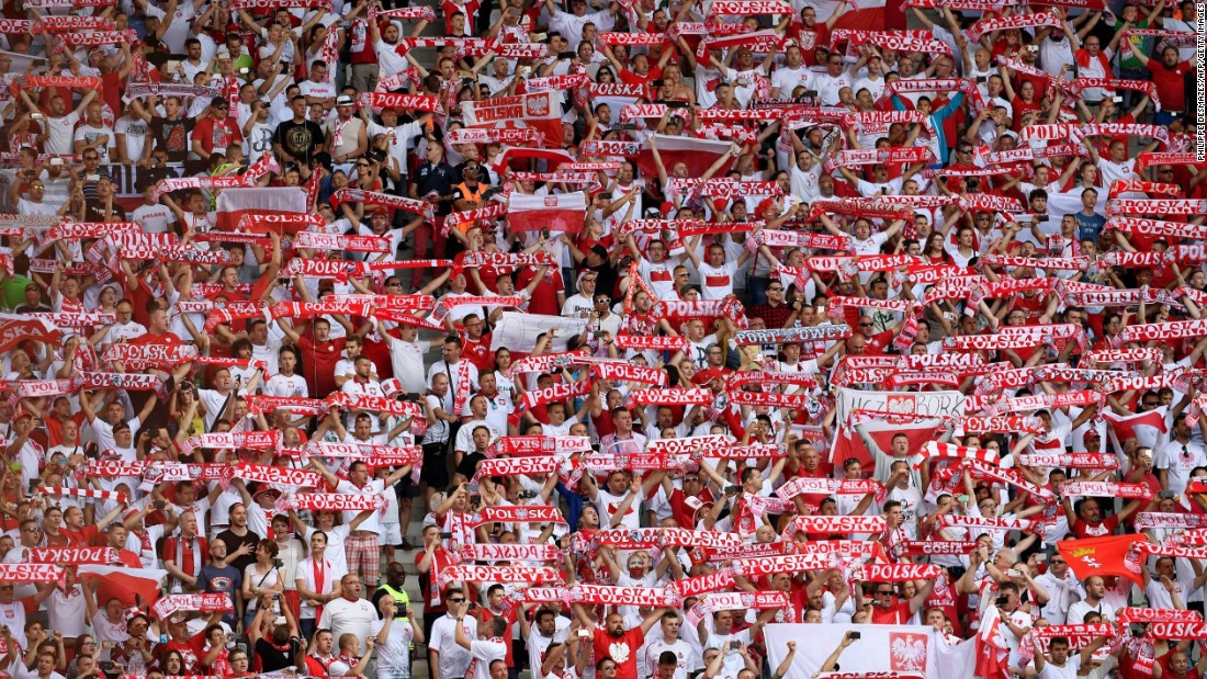 Poland supporters cheer ahead the Euro 2016 Round of 16 football match between Switzerland and Poland.