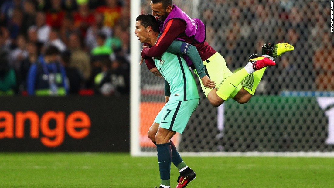 Eduardo jumps to his teammate Cristiano Ronaldo as Portugal celebrates their 1-0 win over Croatia on Saturday, June 25, 2016 at the Bollaert-Delelis stadium in Lens, France. 