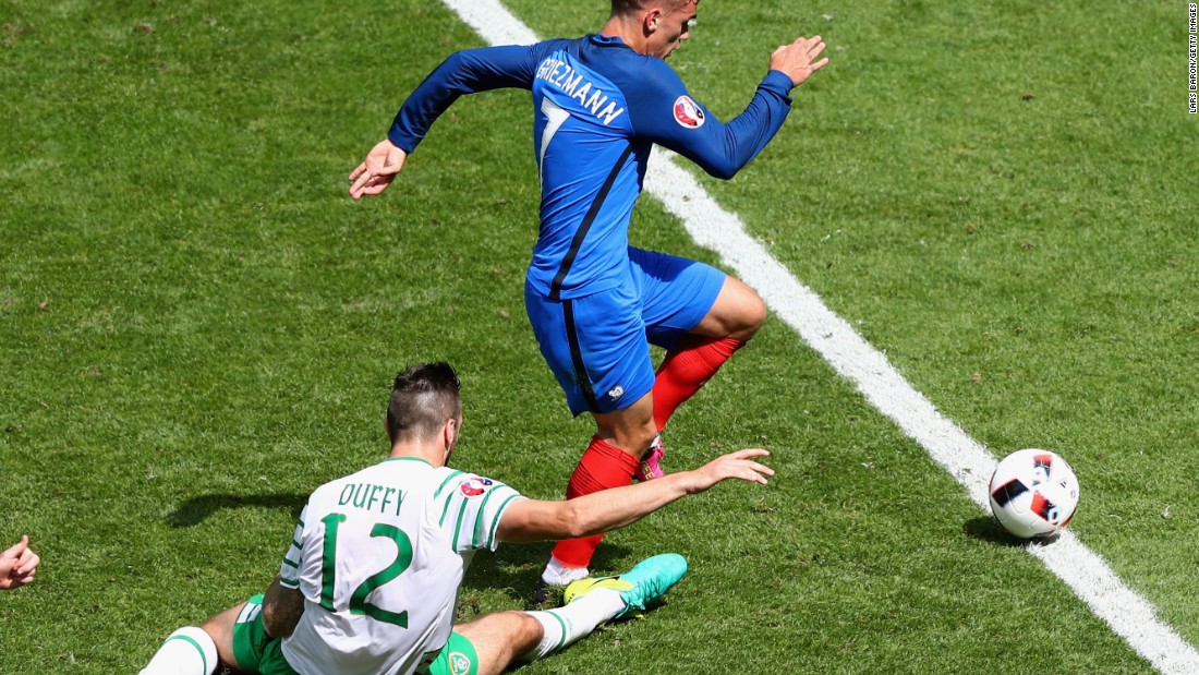 Shane Duffy of Ireland fouls Antoine Griezmann of France, resulting in a red card.