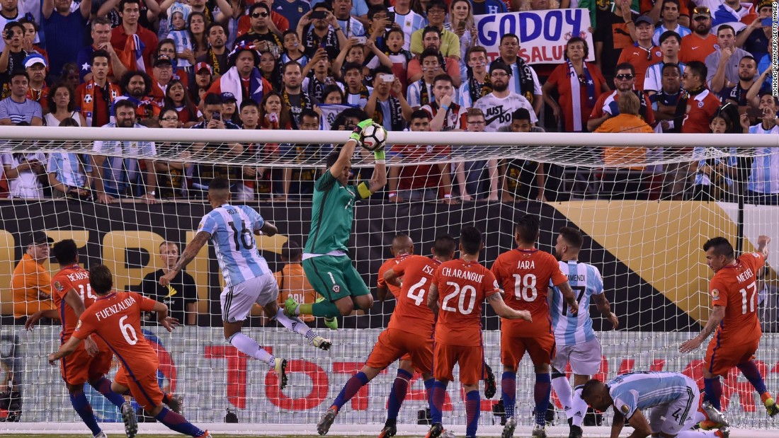 Chile&#39;s goalkeeper Claudio Bravo catches the ball.