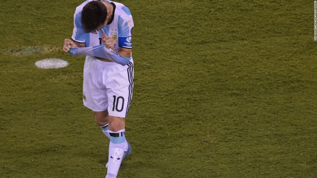 Argentina&#39;s Lionel Messi gestures after missing his shot during the penalty shoot-out.