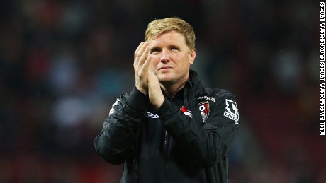 Eddie Howe, Bournemouth manager, applauds fans after a league match between Manchester United and AFC Bournemouth at Old Trafford in May 2016.
