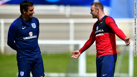 Assistant Coach Gary Neville (left)speaks to England player Wayne Rooney during a UEFA Euro 2016 England training session in Chantilly, France.