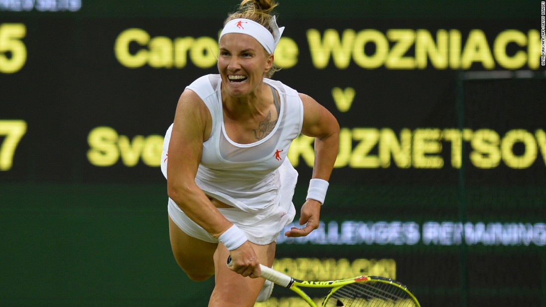 The Dane lost 7-5 6-4 on Centre Court to Russian 13th seed Svetlana Kuznetsova, who next faces Tara Moore. The Hong Kong-born Brit is in the second round of a grand slam for the first time after beating Belgium&#39;s Alison van Uytvanck 6-3 6-2. 