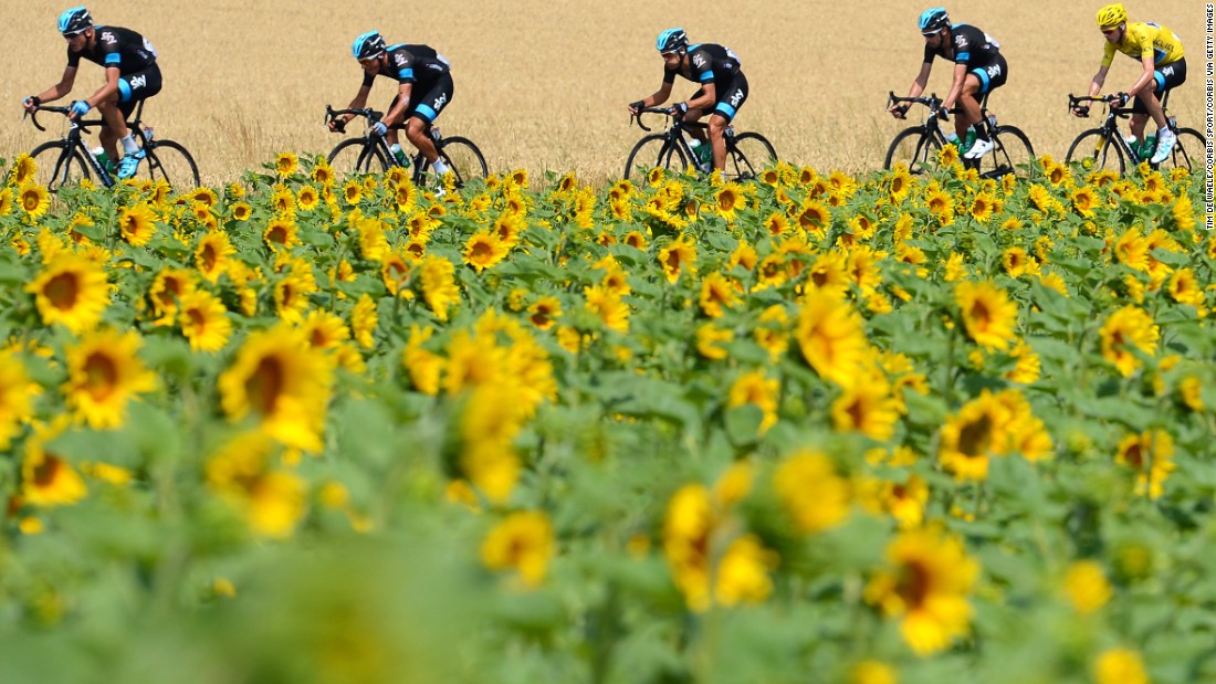 The favorite to win the 2016 race is Team Sky&#39;s Chris Froome, who is pictured at the back.