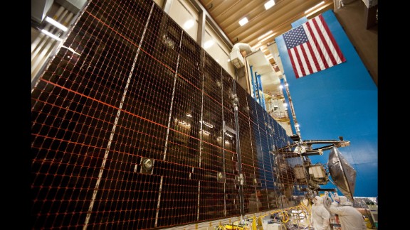 Technicians test the three massive solar arrays that power the Juno spacecraft. In this photo taken February 2, 2011, each solar array is unfurled at a Lockheed Martin Space Systems facility in Denver.