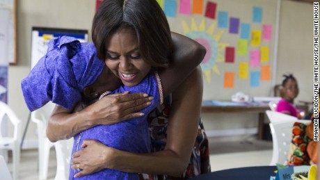 Michelle Obama hugs a student following a lesson plan about girls&#39; leadership and self-esteem in support of the Let Girls Learn initiative, in Kakata, Liberia, June 27. 