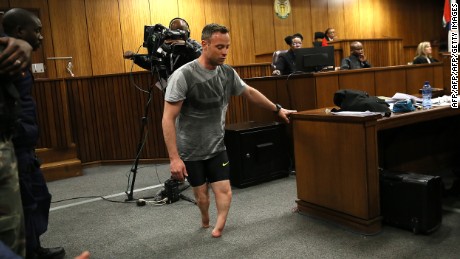 Oscar Pistorius walks on stumps in court