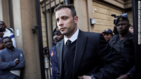 South African Paralympian Oscar Pistorius leaves the Pretoria High Court on June 15, 2016, after the third day of his resentencing hearing for the 2013 murder of his girlfriend Reeva Steenkamp.