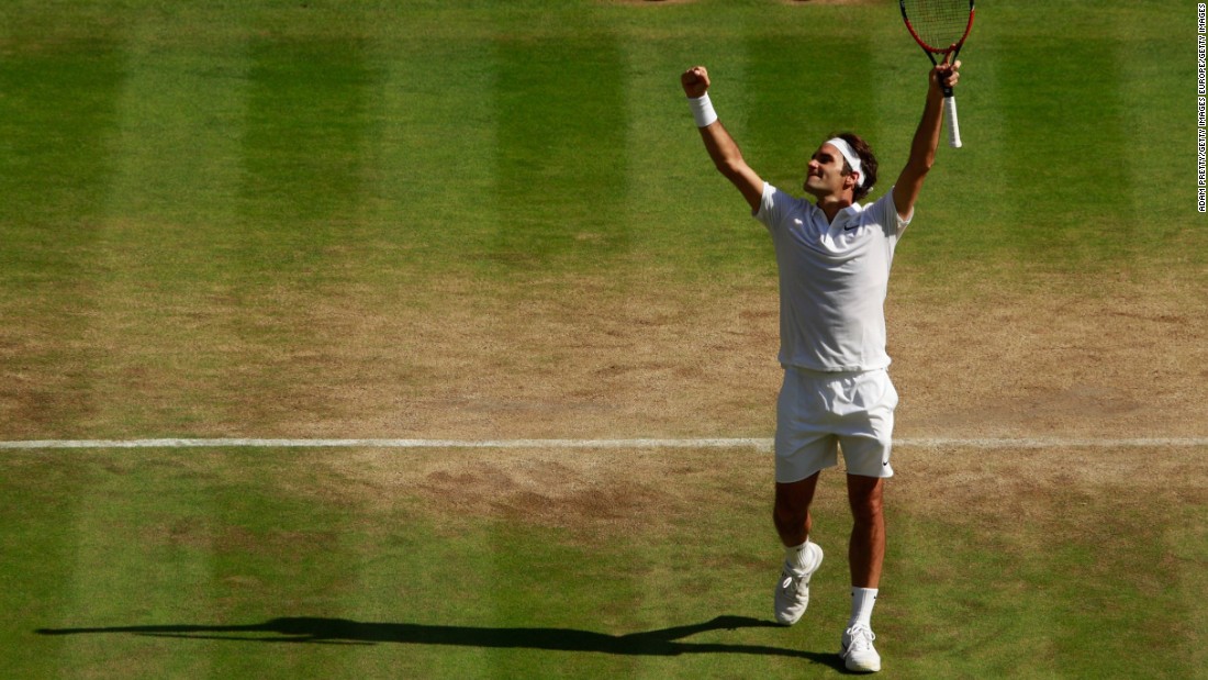 Seven-time Wimbledon champion Roger Federer rallied from two sets down to beat Marin Cilic and advance to the last four.