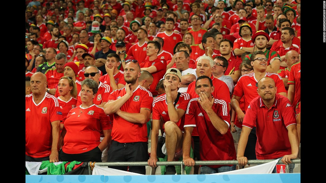 Wales&#39; fans look dejected during the match.