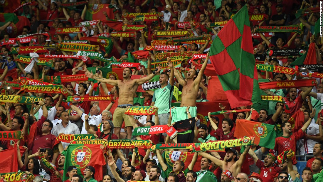 Portugal&#39;s supporters cheer their team after the second goal.