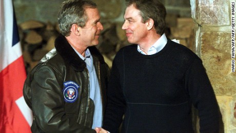 Tony Blair holds a joint press conference with George W. Bush near the presidential retreat Camp David in 2001.