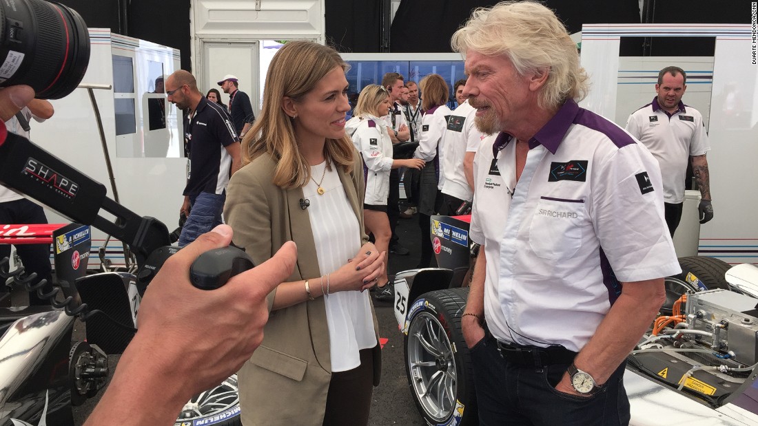 Richard Branson talks to CNN Supercharged presenter Nicki Shields in the DS Virgin Racing pit garage. 