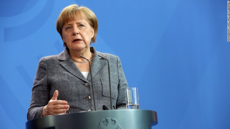 Merkel calls for full veil ban