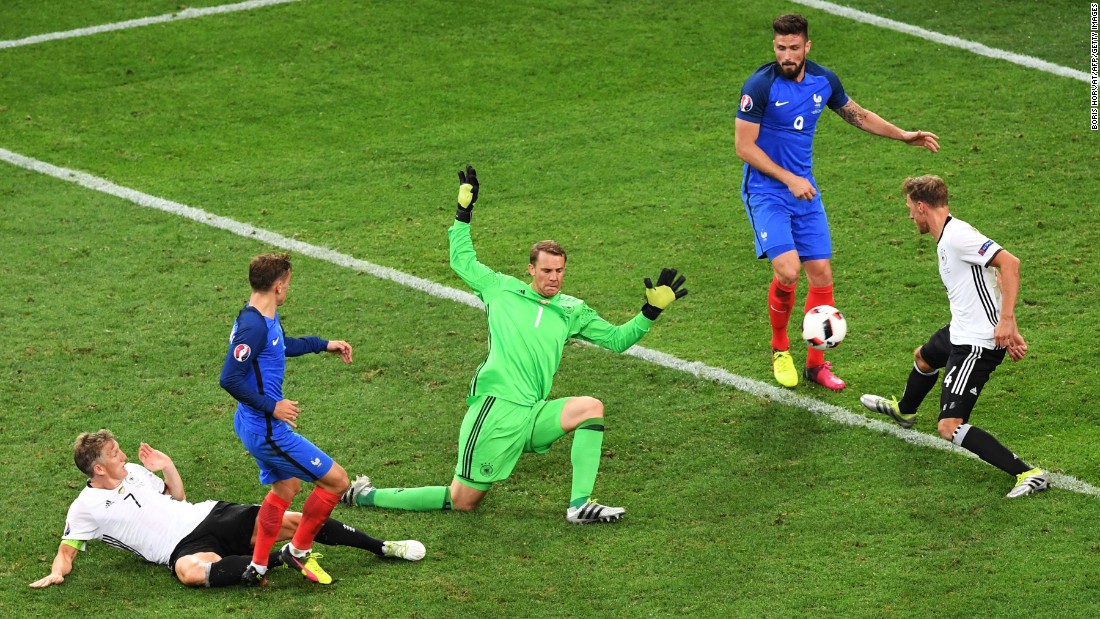 Antoine Griezmann, second from left, scores the second goal of the match. Griezmann had both of France&#39;s goals, and he leads the tournament with six goals scored.