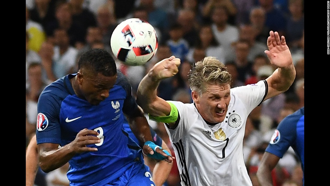 The penalty was awarded after Germany&#39;s Bastian Schweinsteiger, right, handled the ball in the box.