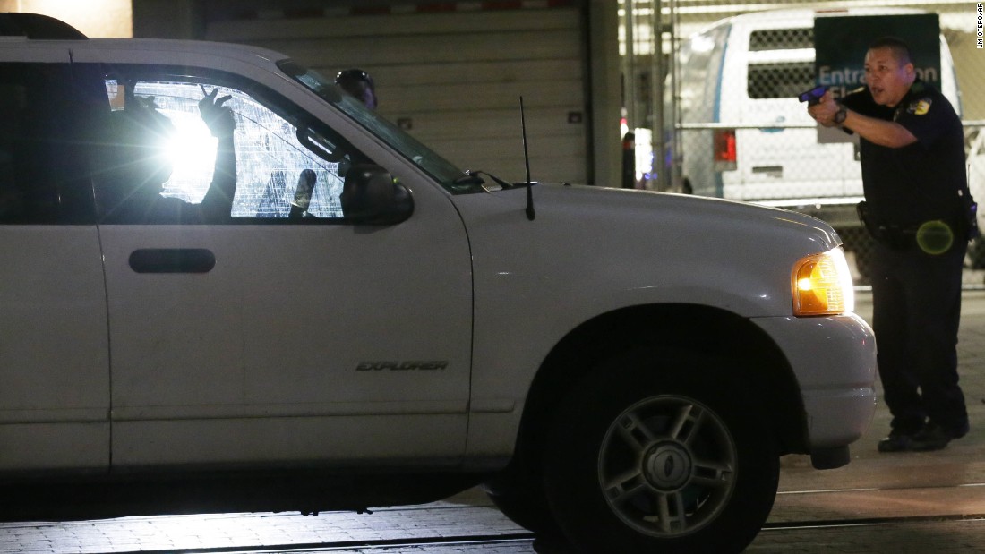 Police stop a driver in downtown Dallas.