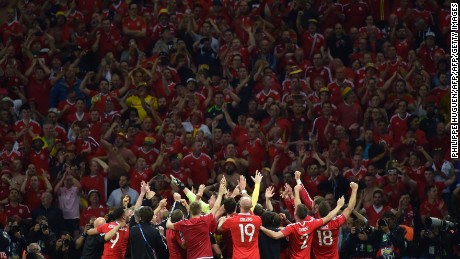 Wales players celebrate their team&#39;s 3-1 win over Belgium at Euro 2016.