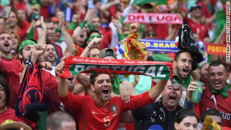 PARIS, FRANCE - JULY 10:  Portugal fans enjoy the atmosphere prior to the UEFA EURO 2016 Final match between Portugal and France at Stade de France on July 10, 2016 in Paris, France.  (Photo by Matthias Hangst/Getty Images)