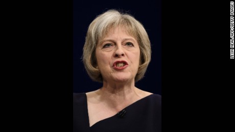 Britain&#39;s Home Secretary Theresa May addresses delegates on the third day of the annual Conservative party conference in Manchester, north west England, on October 6, 2015. AFP PHOTO / LEON NEAL        (Photo credit should read LEON NEAL/AFP/Getty Images)