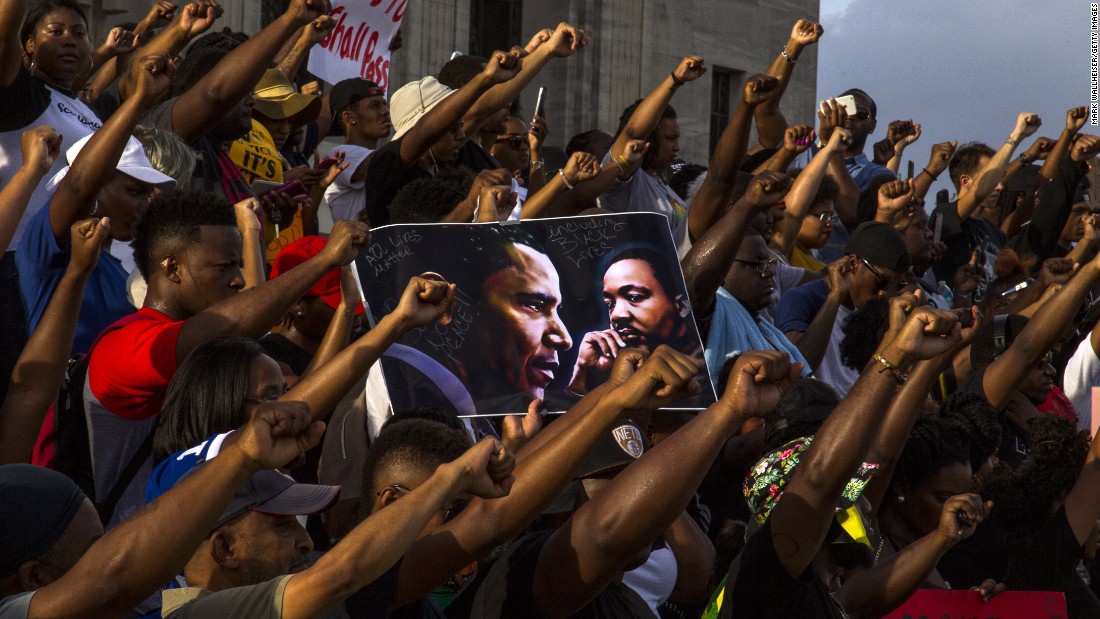 Demonstrators gather on July 9 at the Louisiana Capitol to protest the shooting of &lt;a href=&quot;http://www.cnn.com/2016/07/07/us/baton-rouge-alton-sterling-shooting/index.html?utm_source=feedburner&amp;utm_medium=feed&amp;utm_campaign=Feed%3A+rss%2Fedition_us+(RSS%3A+CNNi+-+U.S.)&quot; target=&quot;_blank&quot;&gt;Alton Sterling&lt;/a&gt; in Baton Rouge.