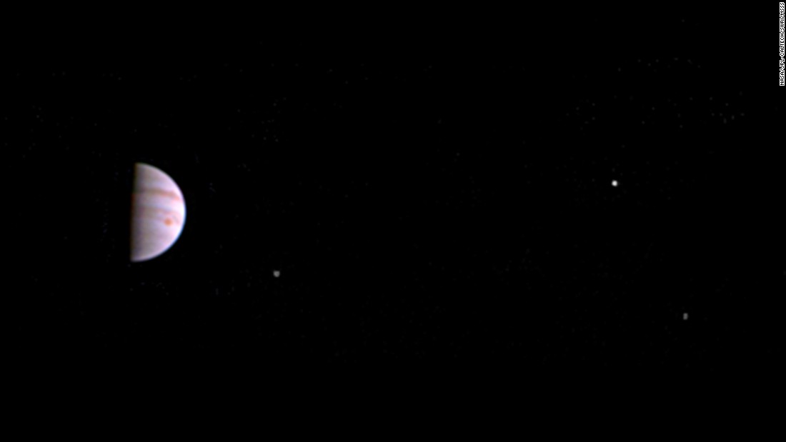 NASA&#39;s Juno spacecraft has sent back its first photo of Jupiter, left, since entering into orbit around the planet. The photo is made from some of the first images taken by JunoCam and shows three of the massive planet&#39;s four largest moons: from left, Io, Europa and Ganymede.