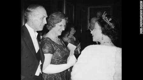 The Queen meets former Prime Minister Sir Alec Douglas-Home and Lady Home at County Hall in London, November, 11 1964.