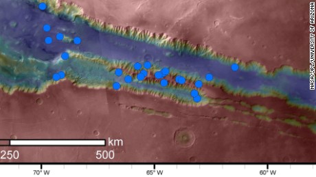 The blue dots indicate active sites of RSL in the Valles Marineris canyon region. These are the highest density of RSL known.