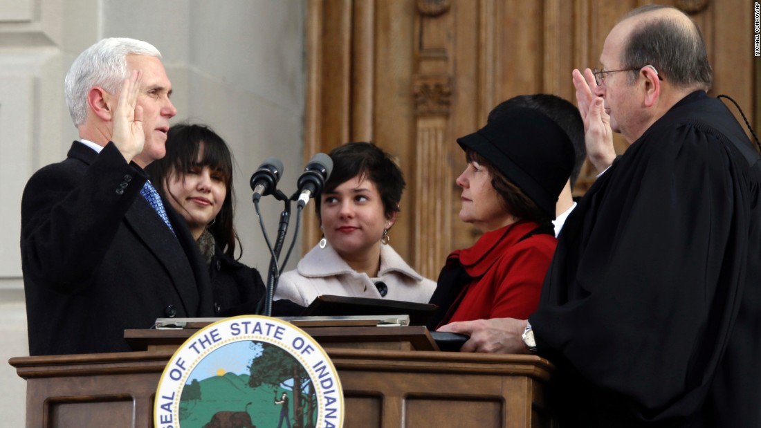 Pence is sworn in as Indiana&#39;s 50th governor in 2013.