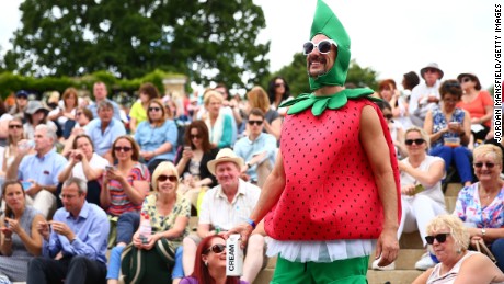 &quot;Strawberry Man&quot; watches the tennis from Murray mound.