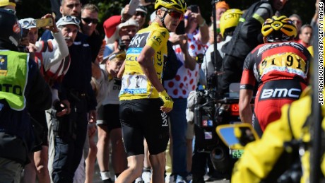 Chris Froome is forced to run up part of Mont Ventoux on Bastille Day.