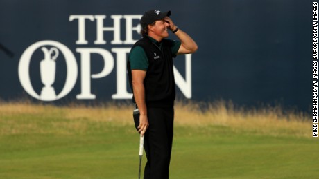 Mickelson was devastated to see his final history-making putt stay out.