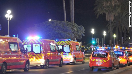 Fire department ambulances and vehicles are parked near the scene of an attack after a truck drove on to the sidewalk and plowed through a crowd of revelers who&#39;d gathered to watch the fireworks in the French resort city of Nice, southern France, Friday, July 15, 2016. A spokesman for France&#39;s Interior Ministry says there are likely to be &quot;several dozen dead&quot; after a truck drove into a crowd of revelers celebrating Bastille Day in the French city of Nice. (AP Photo/Christian Alminana)