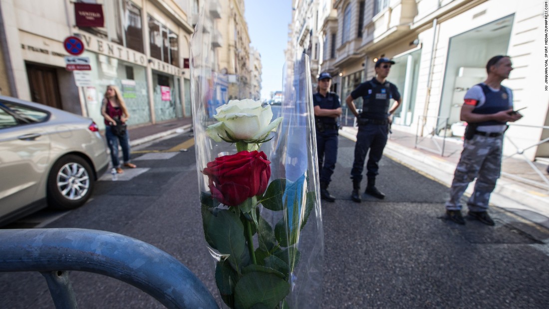 Security personnel stand guard near Nice&#39;s Promenade des Anglais.