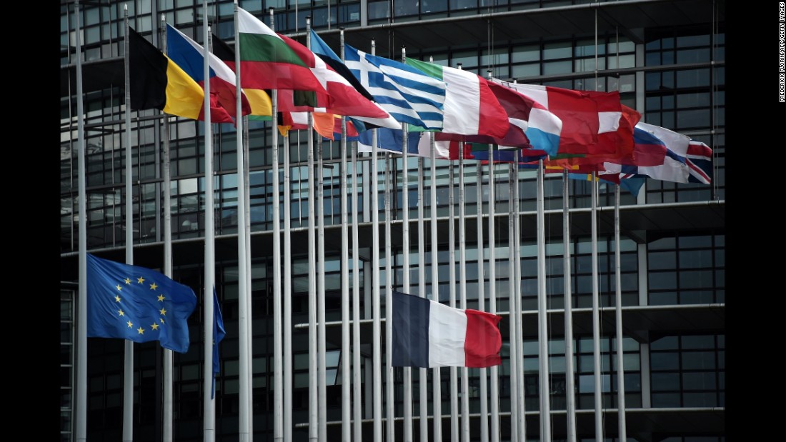 The French and European Union flags fly at half-staff in front of the European Parliament building in Strasbourg, France.