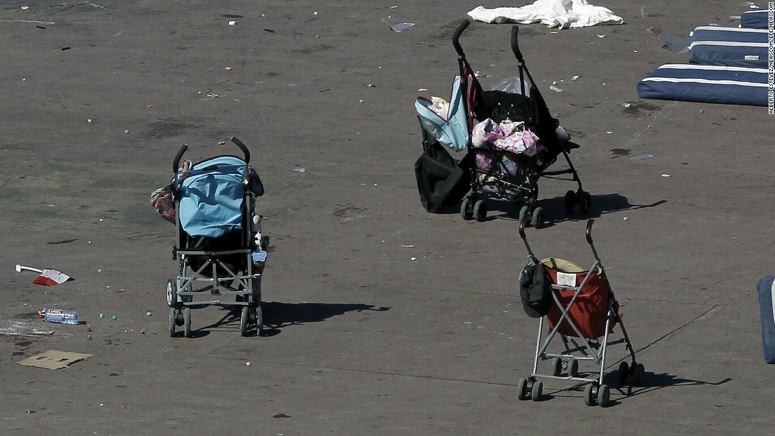 Baby strollers are seen on the Promenade des Anglais in Nice, France, on Friday, July 15. A 31-year-old native of Tunisia and resident of Nice drove into a crowd during the southern French city&#39;s Bastille Day celebrations around 10:45 p.m. on Thursday, July 14, killing at least 84 people and leaving around 202 injured.