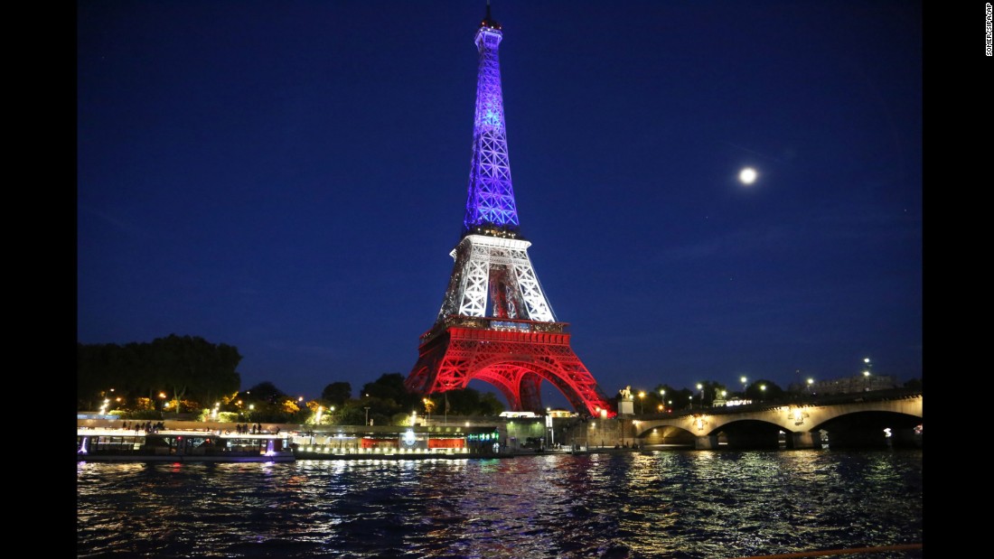 The Effiel Tower is illuminates in the colors of French national flag to pay tribute to the victims of the Nice terrorist attack France on July 15