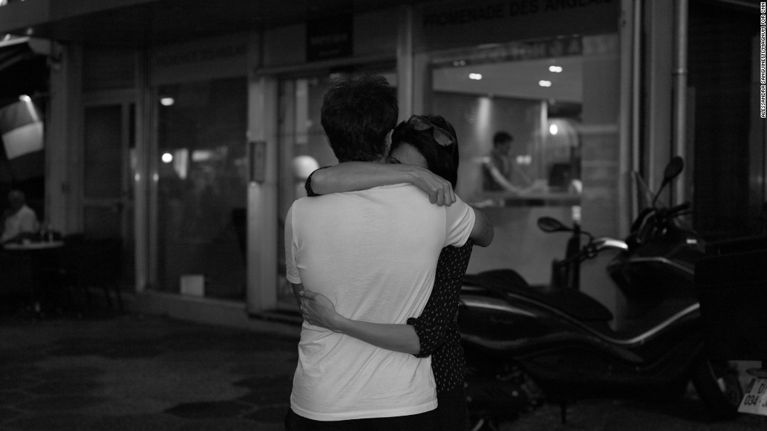 Two people embrace. Near the Promenade des Anglais, Sanguinetti says people were hugging and leaving flowers.